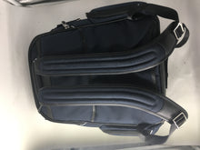 Tumi navy backpack
