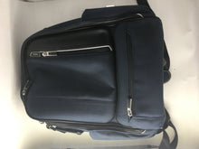 Tumi navy backpack